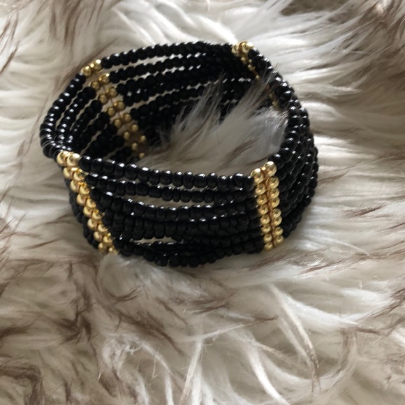 Black and gold stretch bracelet - Picture 1 of 2
